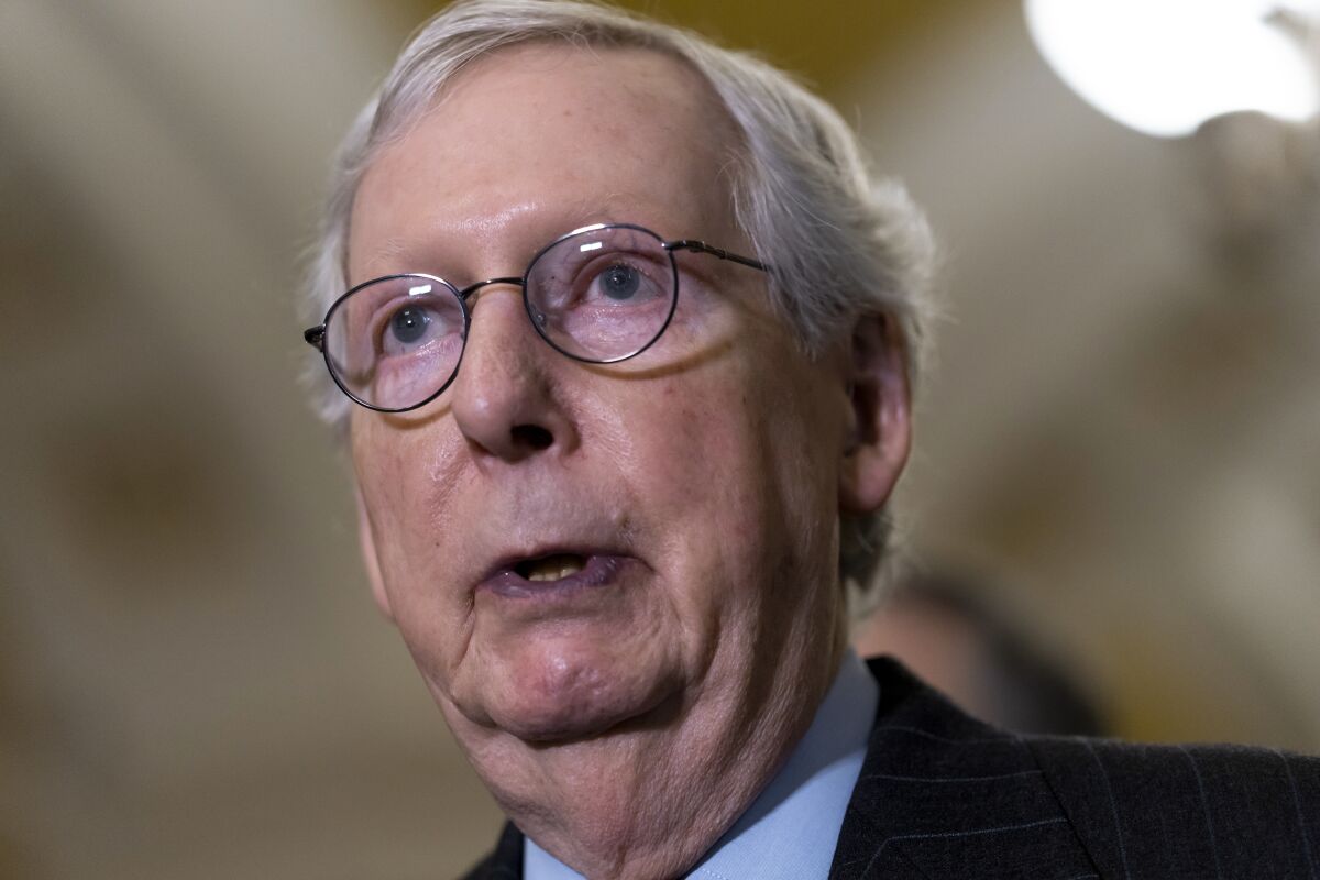 Senate Republican Leader Mitch McConnell speaks to reporters