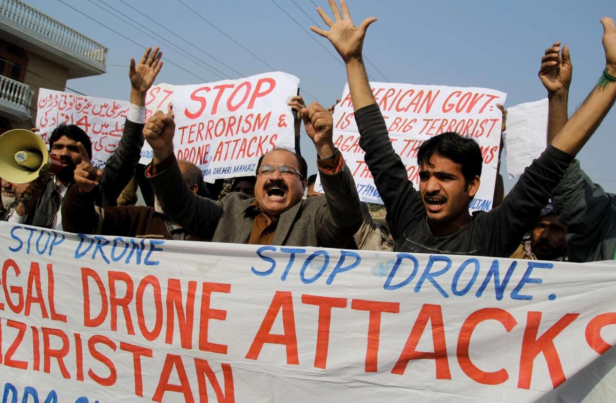 Pakistani activists shout slogans in December as they protest a U.S. drone attack in the town of Multan. The drone campaign is deeply unpopular in Pakistan.