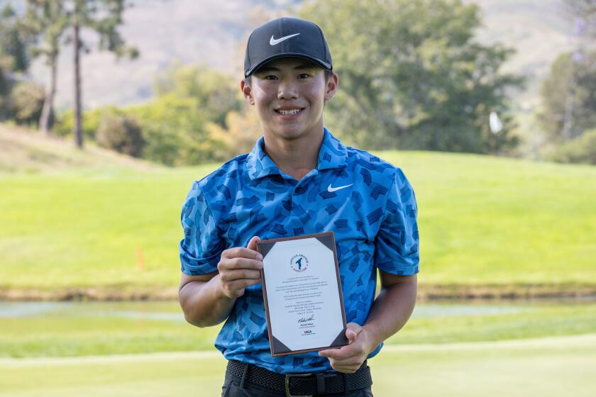 Jaden Soong celebrates after winning the Southern California Golf Assn. Amateur Championship.