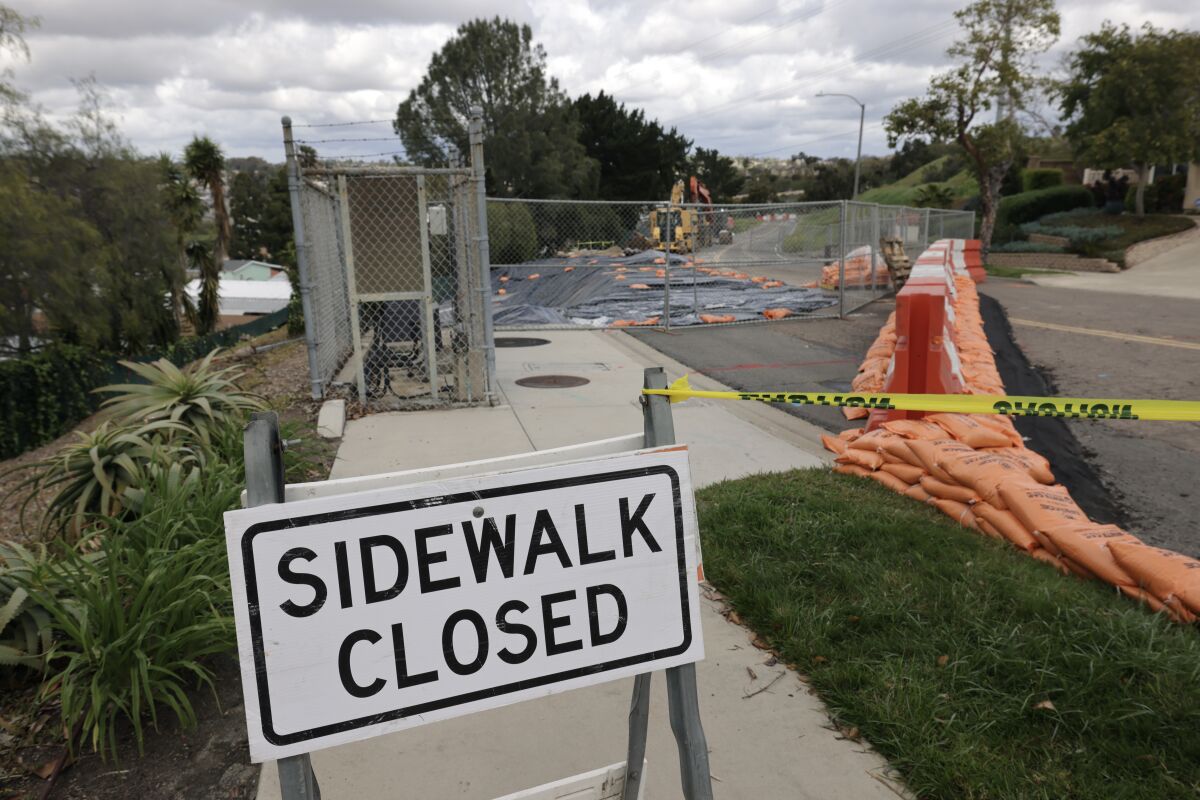 The sidewalk on Skyhaven Lane in Oceanside is closed Thursday for repairs to an area where a landslide occurred.