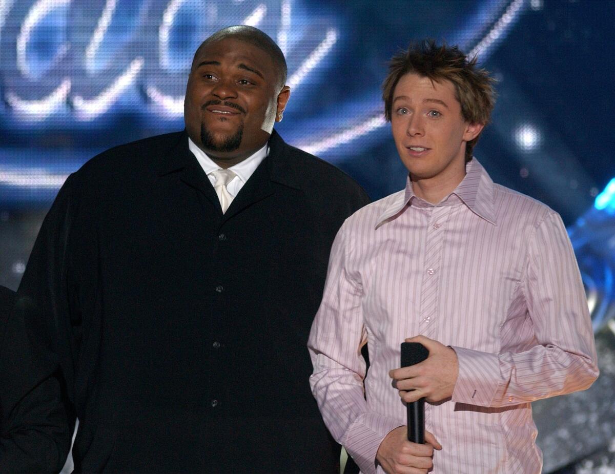 In a file photo from 2003, Clay Aiken, right, with eventual "American Idol" winner Ruben Studdard.