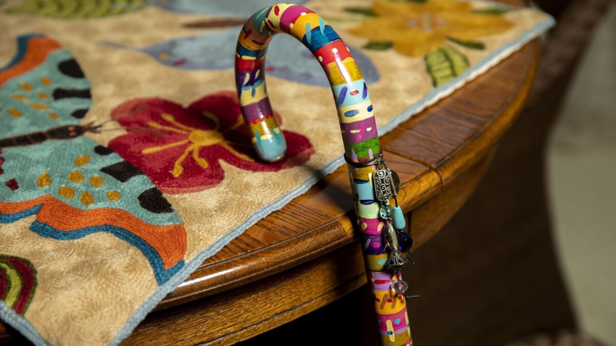 The colorfully decorated cane of Rolly Crump.