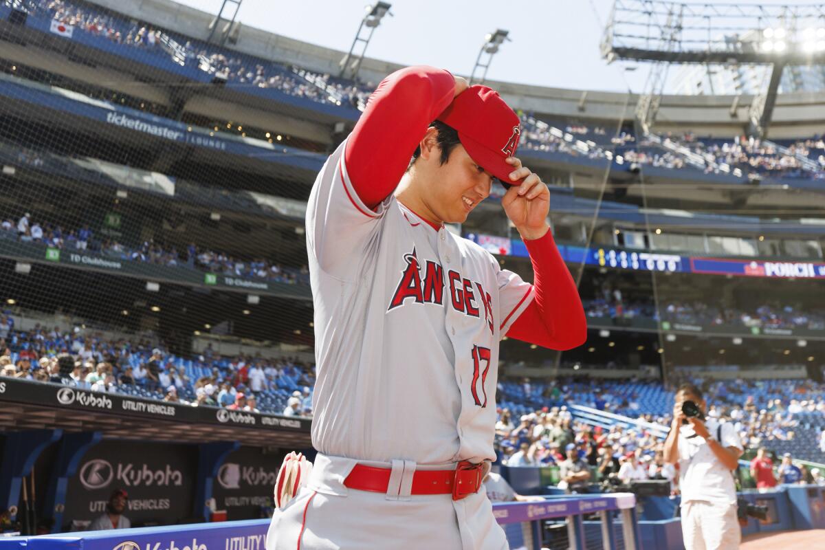 The Angels' Shohei Ohtani takes the field ahead of Sunday's game against the Blue Jays in Toronto.