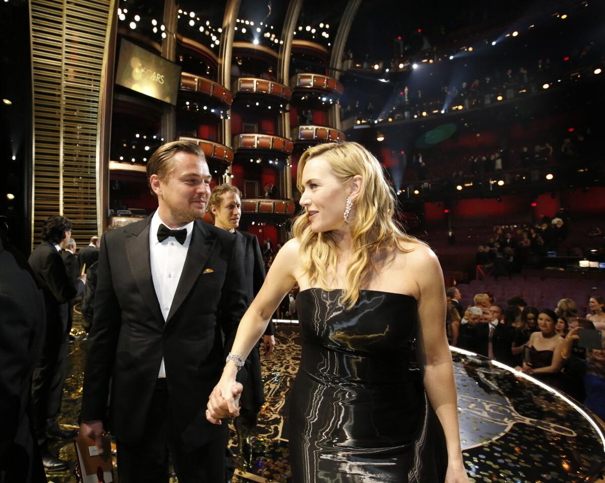 Leonardo DiCaprio and Kate Winslet after the conclusion of the 2016 Academy Awards.
