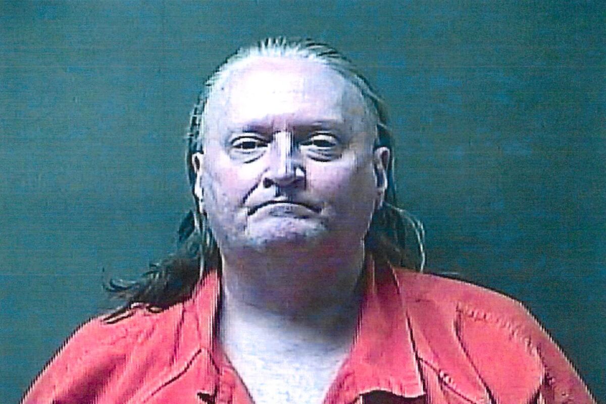 This booking photo provided by the LaPorte County Sheriff’s Office shows Thomas Holifield, 59, who is charged with murder in the June 1, 2021, methanol poisoning death of 64-year-old Pamela Keltz, according to Michigan City, Ind., police and the LaPorte County coroner. Holifield allegedly killed his roommate by repeatedly spiking her beverages with windshield washer fluid because he felt she was disrespecting him by not approving of his heavy drinking, authorities said. (LaPorte County Sheriff’s Office via AP
