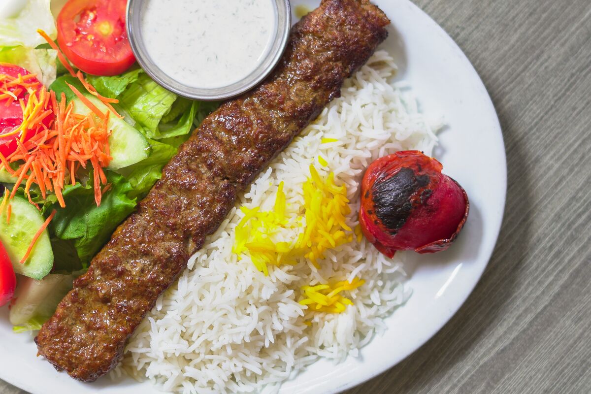 Naab Café's grilled kebab plate with rice and vegetables