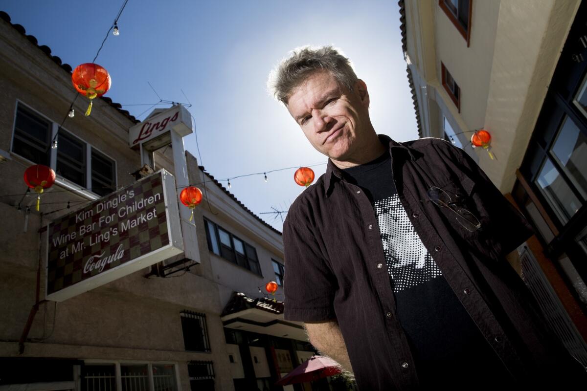 Mat Gleason is photographed outside his Chinatown gallery.