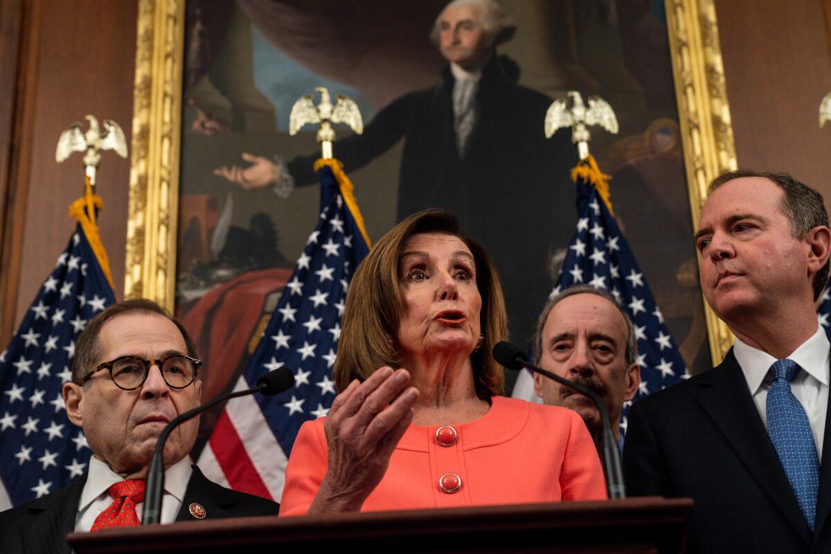 Speaker Nancy Pelosi at the signing ceremony for the articles of impeachment with House managers.