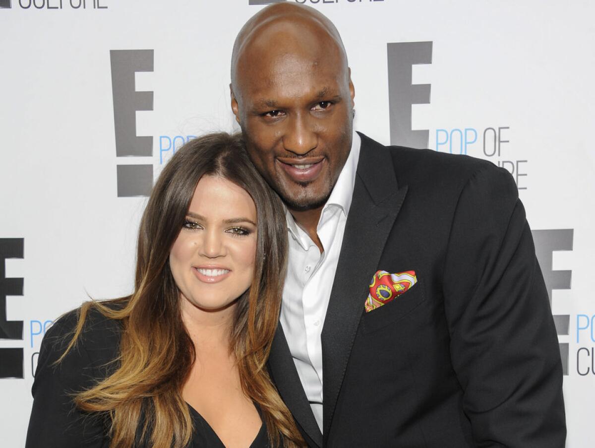 Khloe Kardashian and Lamar Odom, seen here in 2012, reported a major theft at their former home Monday. Kardashian filed for divorce in December.