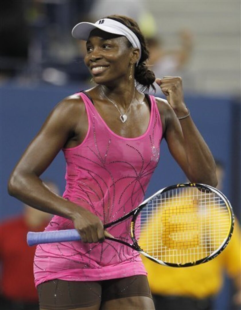 Venus Williams, of the United States, reacts after defeating Francesca Schiavone, of Italy, 7-6 (5), 6-4 in a quarterfinal at the U.S. Open tennis tournament in New York, Tuesday, Sept. 7, 2010. (AP Photo/Mark Humphrey)