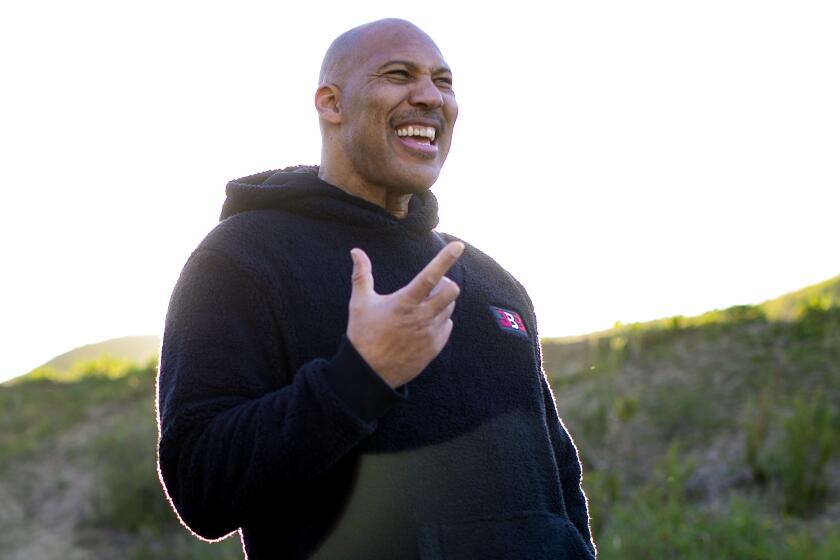 LaVar Ball stands on what was once a dirt path where he use to train his sons in their early years at Chino Hills State Park