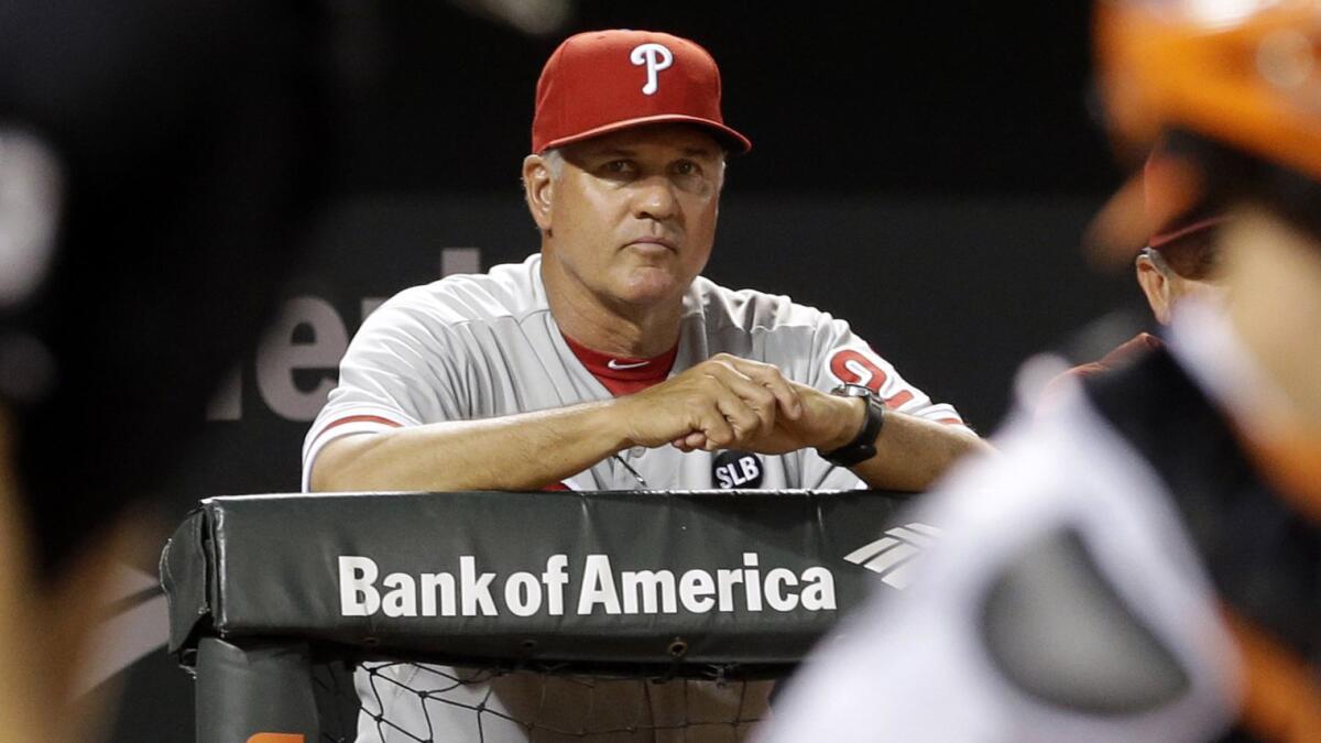 Ryne Sandberg posted a 119-159 mark over parts of three seasons as manager of the Philadelphia Phillies.