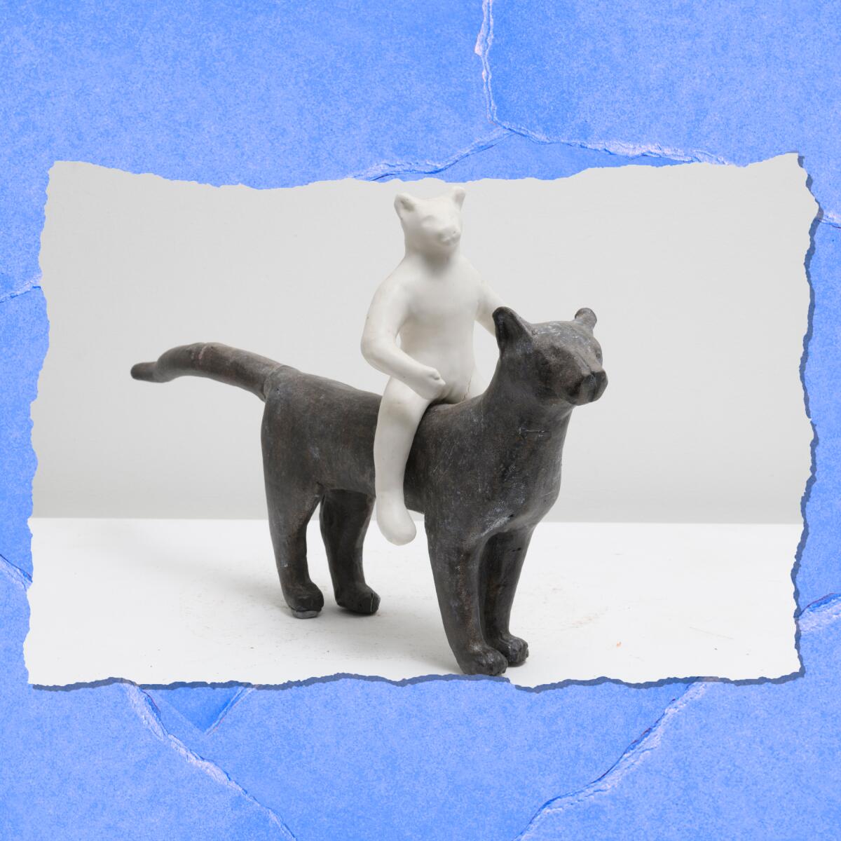 A bear figure sits upright on the back of a panther-like shape.