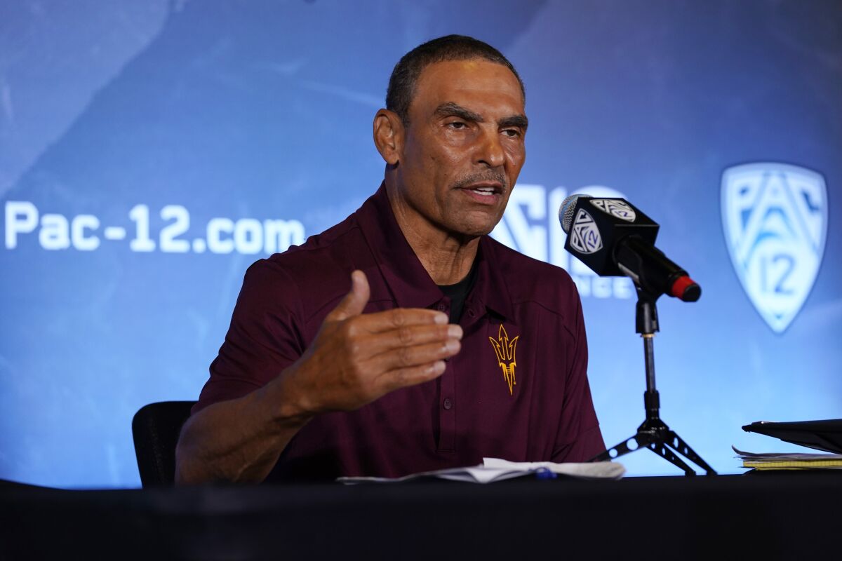 Arizona State head coach Herm Edwards answers questions during the Pac-12 Conference NCAA college football Media Day Tuesday, July 27, 2021, in Los Angeles. (AP Photo/Marcio Jose Sanchez)