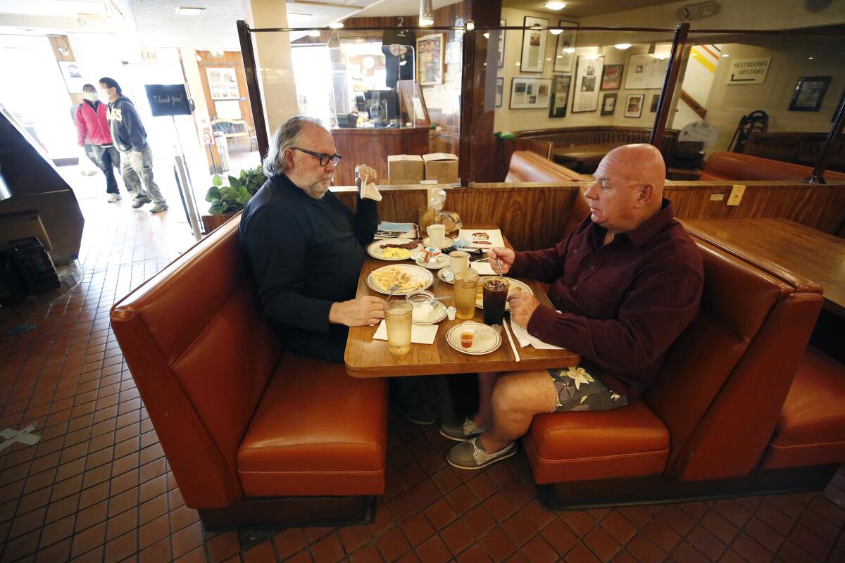 Kelly Cox, left, and Rick Ingold at Canter's Delicatessen.
