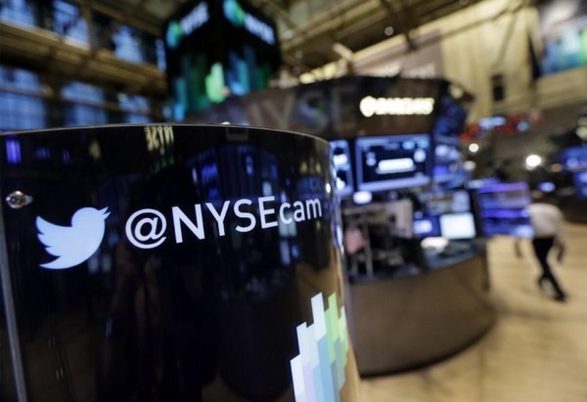 Phone post on the floor of the New York Stock Exchange features a Twitter logo. Twitter will begin trading on the New York Stock Exchange on Thursday morning after setting a price for its IPO sometime Wednesday evening.