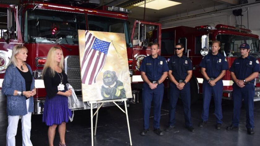 Wendy Moldow, Dr. Noemi Balinth and Solana Beach firefighters