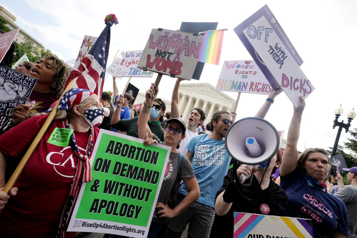 People rally in support of abortion rights outside the Supreme Court in Washington. 