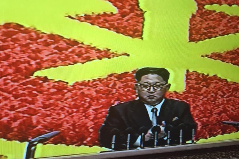 In an image taken from TV, Kim Jong Un addresses the National Party Congress in Pyongyang.