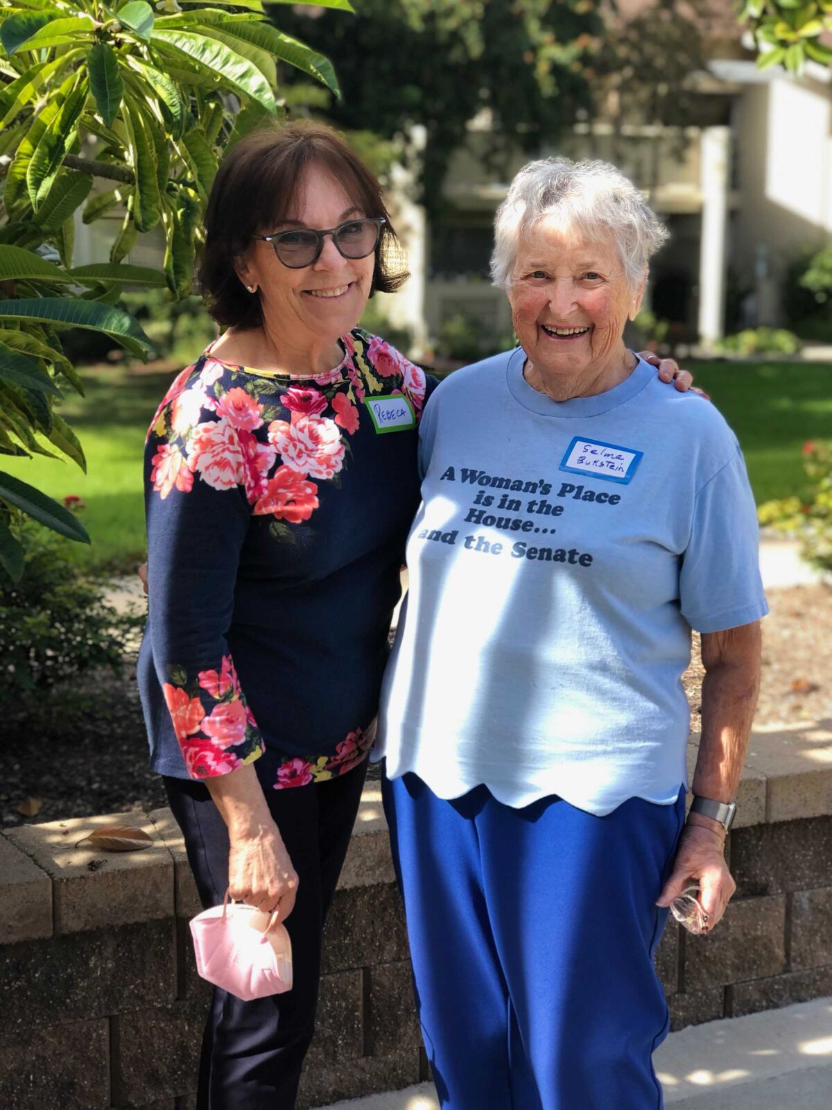Rebeca Gilad, left, with Selma Bukstein, right, residents of the Laguna Woods retirement community,