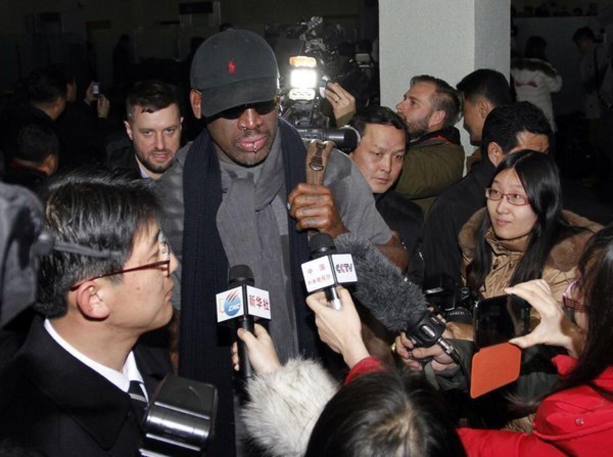 Dennis Rodman is surrounded by journalists upon his arrival at Pyongyang Airport in North Korea on Tuesday.