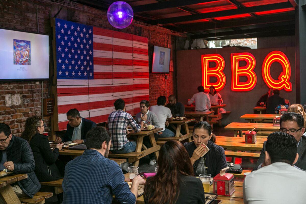 Pinche Gringo is a popular Mexico City barbecue joint whose American owner has made a special effort to hire deportees and other returnees from the U.S.