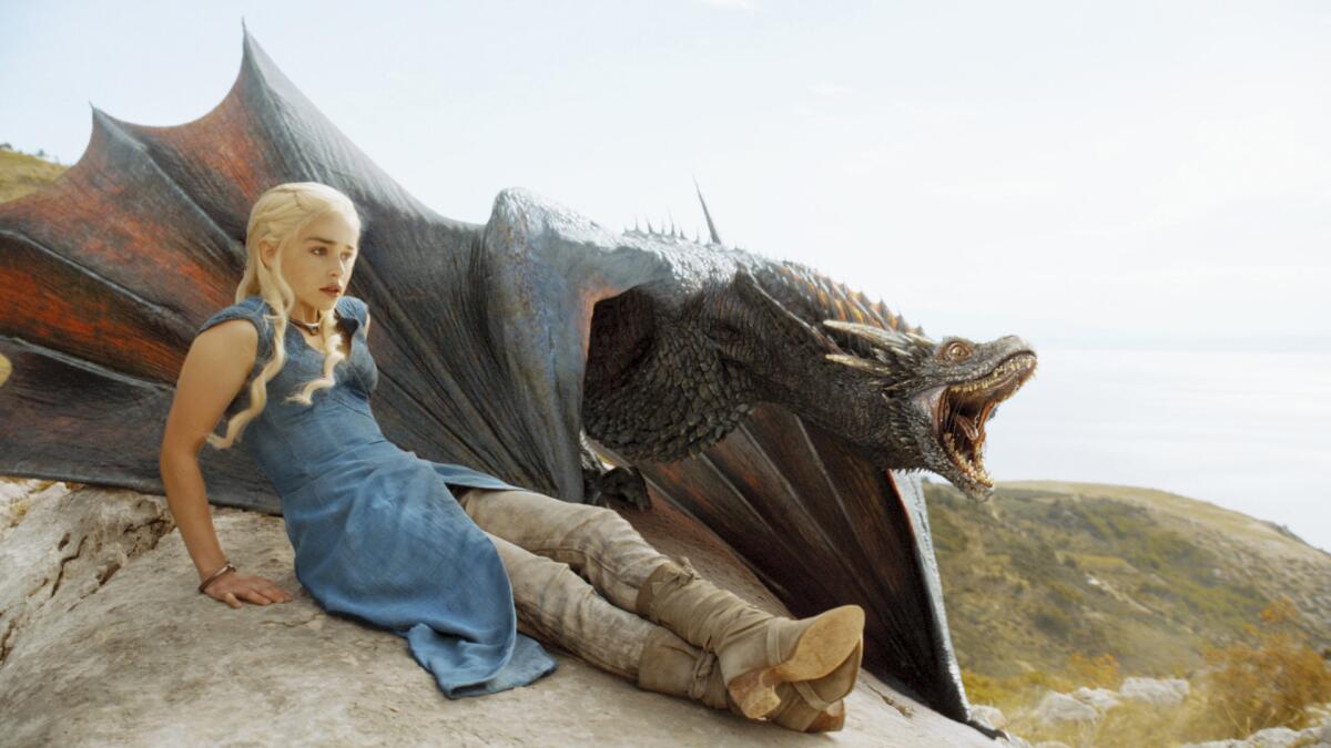 Daenerys Targaryen (Emilia Clarke) with one of her dragons in HBO's "Game of Thrones."