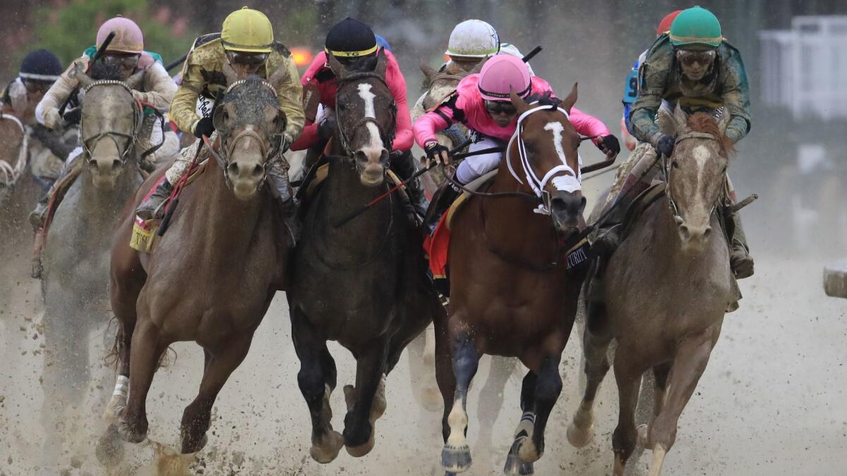 Maximum Security, second from right, initially won the 145th Kentucky Derby on Saturday but was later disqualified.
