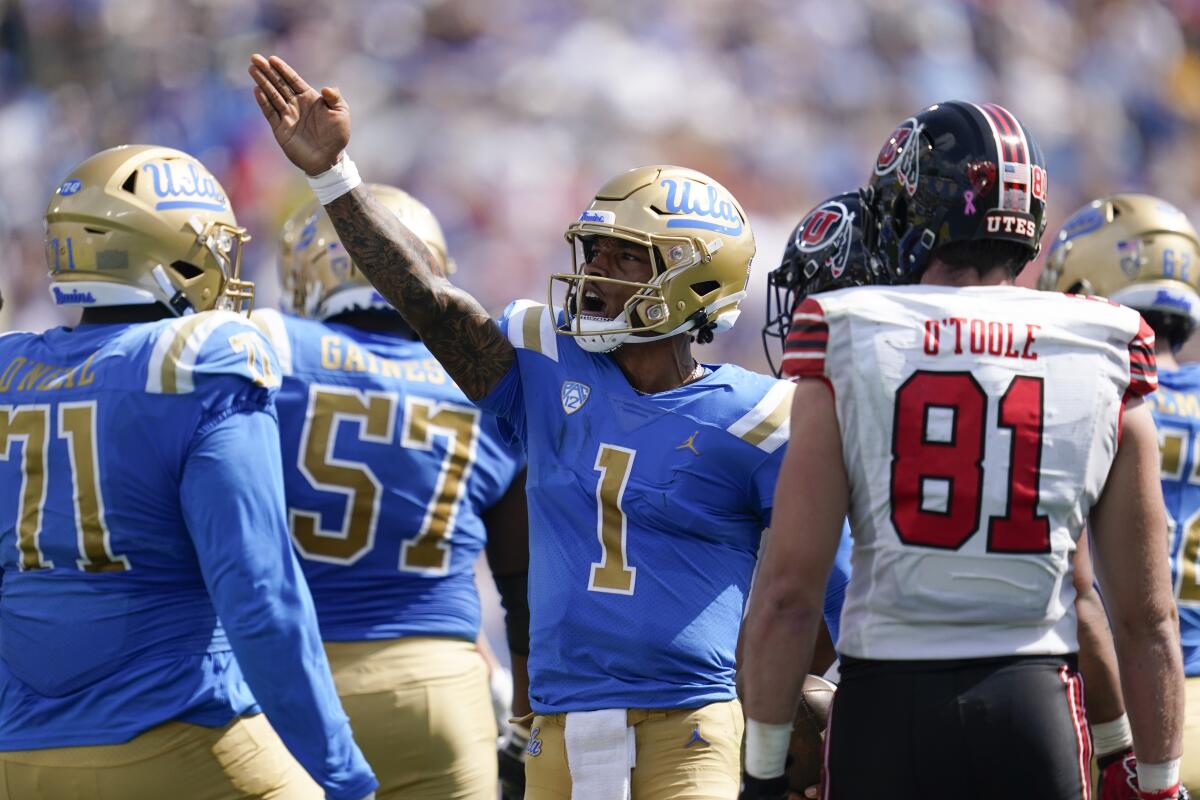 UCLA quarterback Dorian Thompson-Robinson signals for a first down during a win over Utah on Oct. 8.