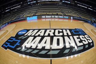 The basketball court at PPG Paints Arena in Pittsburgh is prepared on Thursday, March 17.