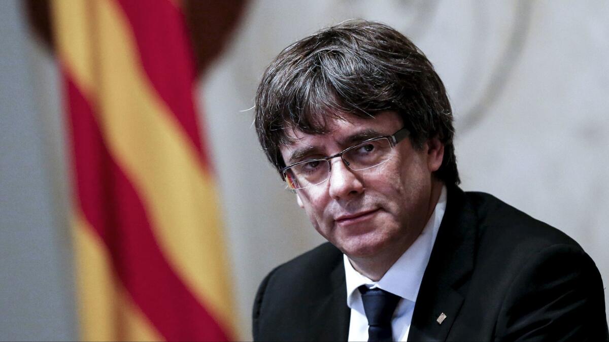 Catalan regional government president Carles Puigdemont attends a meeting Oct. 10, 2017, in Barcelona.