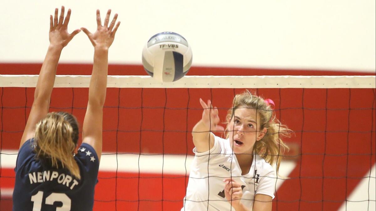 Laguna Beach High's Piper Naess, pictured putting the ball away against Newport Harbor on Oct. 4, helped the Breakers beat Murrieta Mesa in the first round of the CIF Southern Section Division 3 playoffs on Thursday.