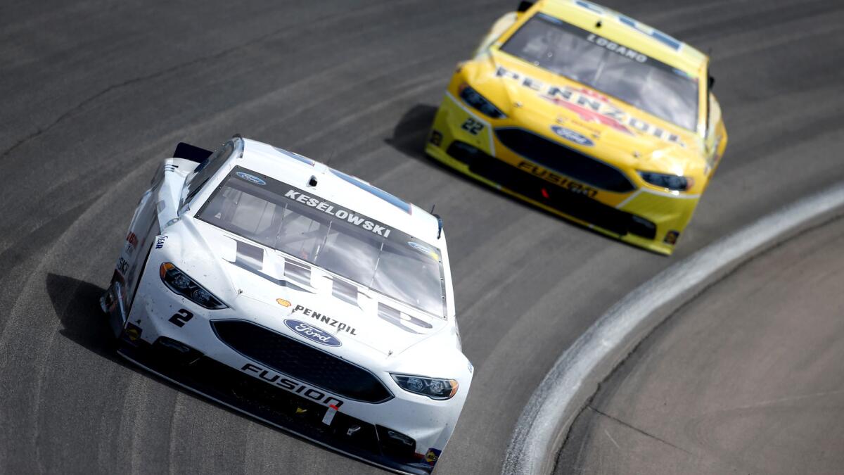 NASCAR driver Brad Keselowski guides his No. 2 Miller Lite Ford through a turn at Las Vegas Motor Speedway during the Sprint Cup race Sunday.