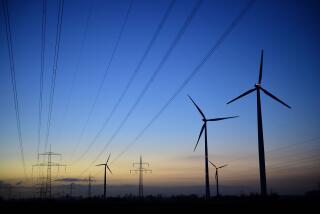 SEHNDE, GERMANY - MARCH 10: High-tension power lines and wind turbines are seen at dawn near a coal-fired Kraftwerk Mehrum power plant at Haemelerwald on March 10, 2015 near Sehnde, Germany. Energy production from conventional-based resources is becoming less profitable as renewable energy production has expanded and matured in Germany in the last decade. RWE, one of Germany's biggest utilities, today warned of pending job cuts due to financial losses derived from its conventional energy production. The Kraftwerk Mehrum plant is majority-owned by Stadtwerke Hannover AG. (Photo by Alexander Koerner/Getty Images) ** OUTS - ELSENT, FPG - OUTS * NM, PH, VA if sourced by CT, LA or MoD **