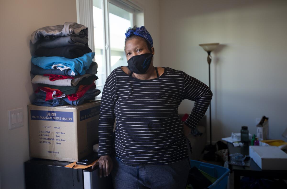 Natosha Johnson moves inside her new home in North Hills. 