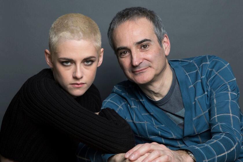 Kristen Stewart, left, and writer-director Olivier Assayas