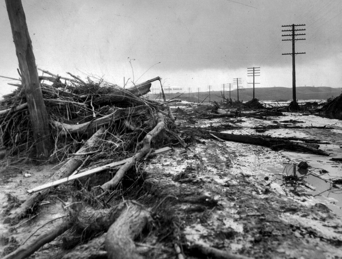 March 13, 1928: Debris littering main highway near Castaic following the collapse of the St. Francis Dam.