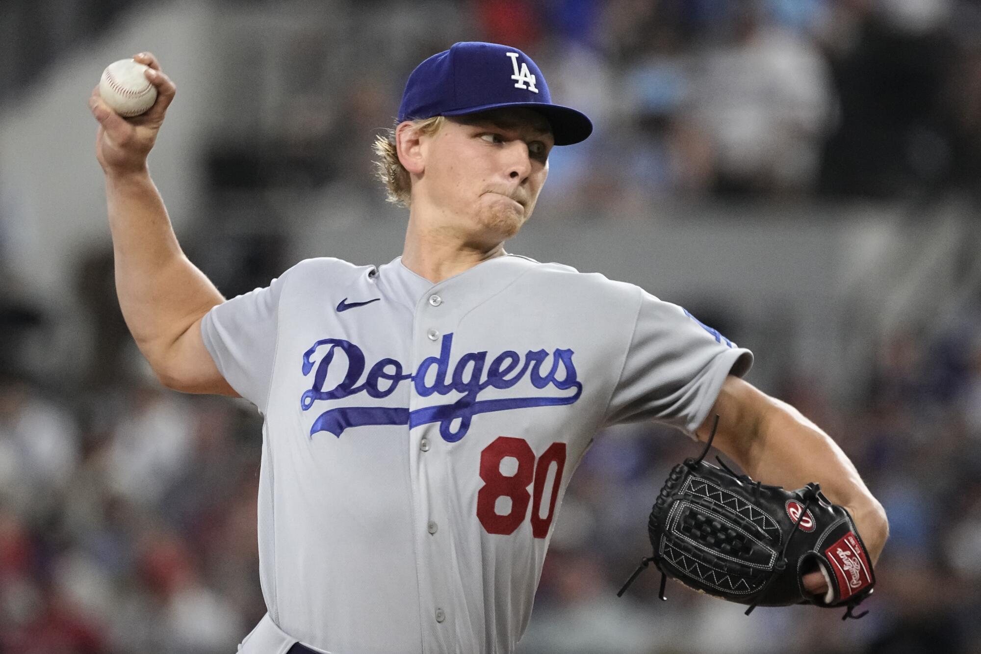 Dodgers pitcher Emmet Sheehan works against the Texas Rangers on Sunday in Arlington, Texas.