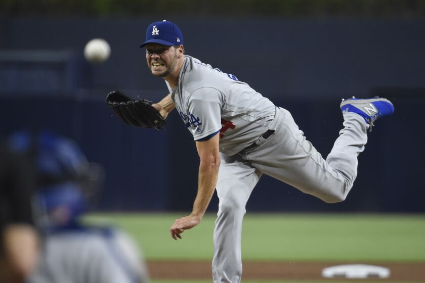 SAN DIEGO, CA - SEPTEMBER 24: Rich Hill #44 of the Los Angeles Dodgers pitches during the the first inning of a baseball game against the San Diego Padres at Petco Park September 24, 2019 in San Diego, California. (Photo by Denis Poroy/Getty Images)