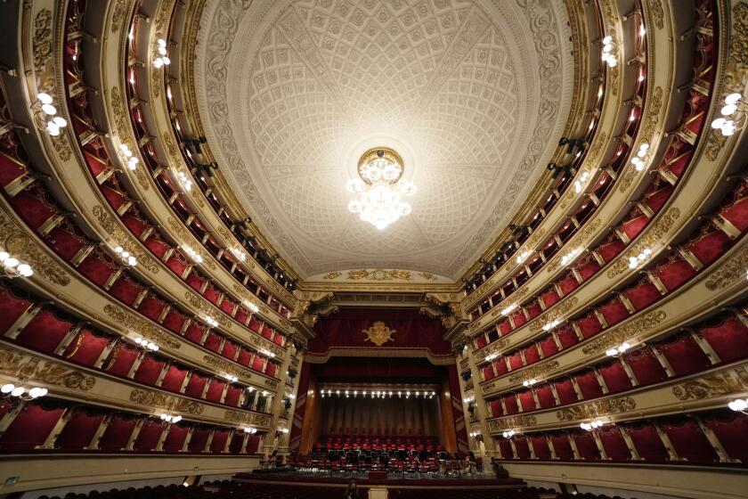 FILE - A view of La Scala opera house in Milan, Italy, on April 4, 2022. Milan’s La Scala, one of the world’s most prestigious and historic opera houses, has named Fortunato Ortombina as its new director. (AP Photo/Luca Bruno, File)