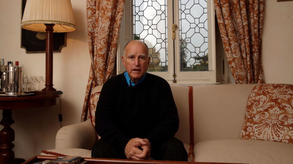 California Gov. Jerry Brown poses for a photo after an interview with the Associated Press in Rome, Friday, Nov. 3, 2017. Brown called climate change an existential threat.