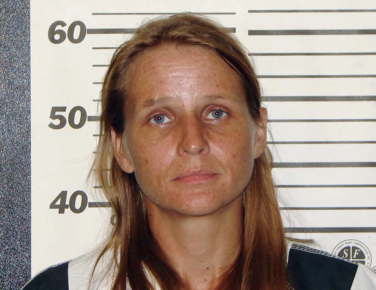 FILE - This undated photo provided by the Ozark County Sheriff's Office in Gainesville, Mo., shows Rebecca Ruud, who, along with her husband, Robert Peat Jr., were indicted Wednesday, Sept. 20, 2017, in the death of the Ruud's biological teenage daughter, who spent most of her life with an adoptive family in Minnesota. In July 2022, Rudd was acquitted of killing her daughter but convicted of abandoning the girl's corpse. On Thursday, Sept. 15, 2022, Rudd was sentenced but will be released from prison soon. (Ozark County Sheriff's Office via AP, File)