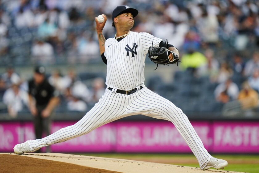 New York Yankees' Luis Gil delivers a pitch during the first inning of the the second baseball game of the team's doubleheader against the Boston Red Sox, Tuesday, Aug. 17, 2021, in New York. (AP Photo/Frank Franklin II)