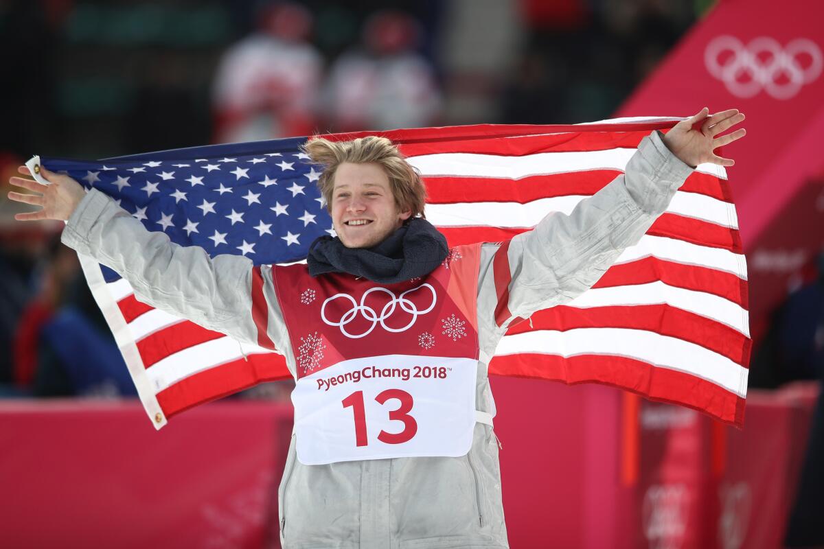 Kyle Mack of the United States celebrates winning the silver medal during the men's Big Air final.