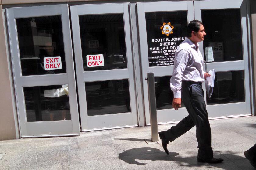 State Sen. Ben Hueso (D-San Diego) walks out of the Sacramento County Jail last month after being booked on suspicion of drunk driving.