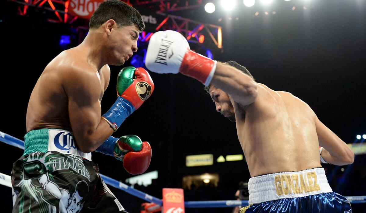 Abner Mares, left, lost to Jhonny Gonzalez in a WBC featherweight title fight last year at StubHub Center.