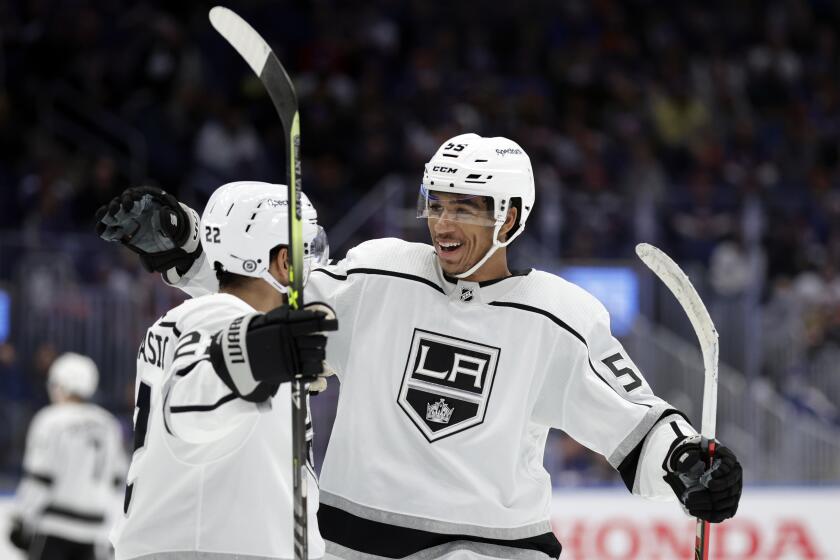 Los Angeles Kings center Quinton Byfield reacts after scoring a goal against the New York Islanders in the first period of an NHL hockey game Thursday, Jan. 27, 2022, in Elmont, N.Y. (AP Photo/Adam Hunger)