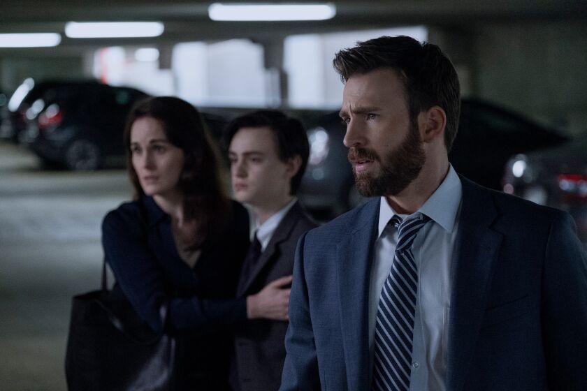 Michelle Dockery, Jaeden Martell and Chris Evans in “Defending Jacob,” which ended with a twist-filled episode.