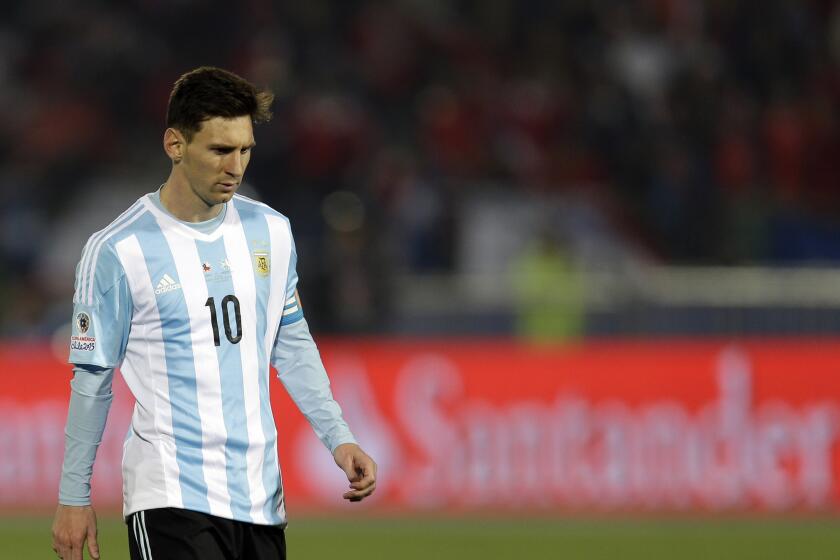 Argentina's Lionel Messi walks away from the Copa America final against Chile on July 4. Chile won in a penalty shootout.