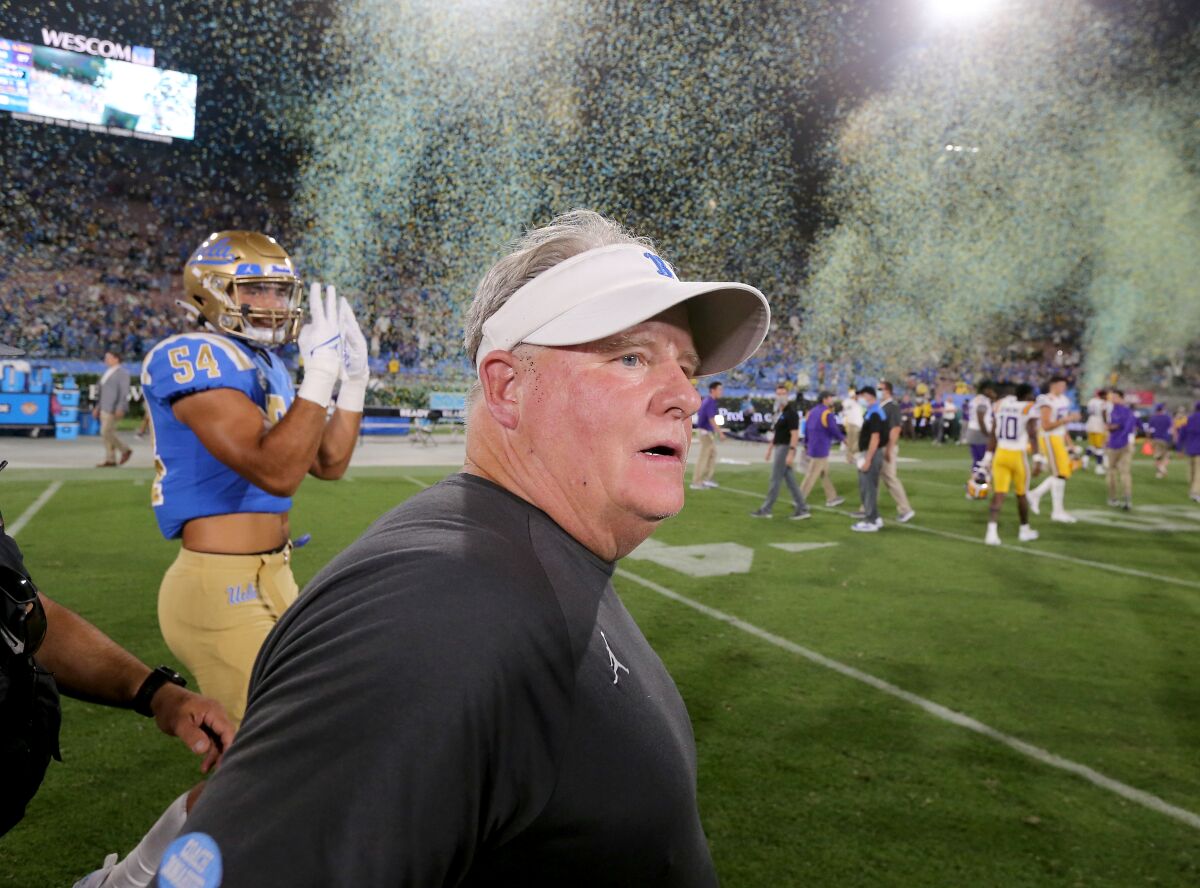 UCLA coach Chip Kelly leaves the field after his Bruins beat LSU 38-27 at the Rose Bowl on Sept. 4.